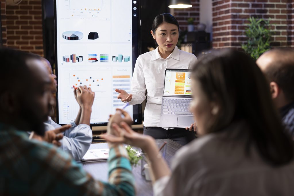 professional woman reviewing financial charts